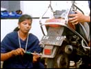 Women mechanics of Madras. Click for a bigger image