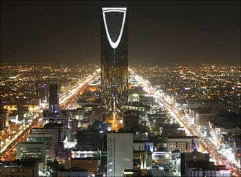 The Kingdom Tower stands in the night above the Saudi capital Riyadh.
