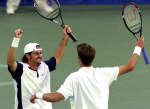 Canadians Sebastien Lareau (L) and Daniel Nestor celebrate. REUTERS/Michael Leckel 