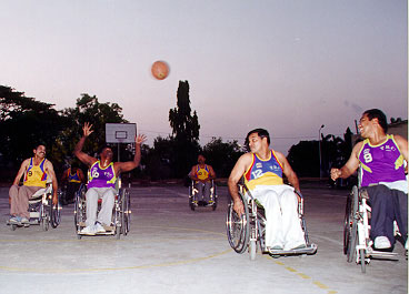 The inmates in action on the basketball courts